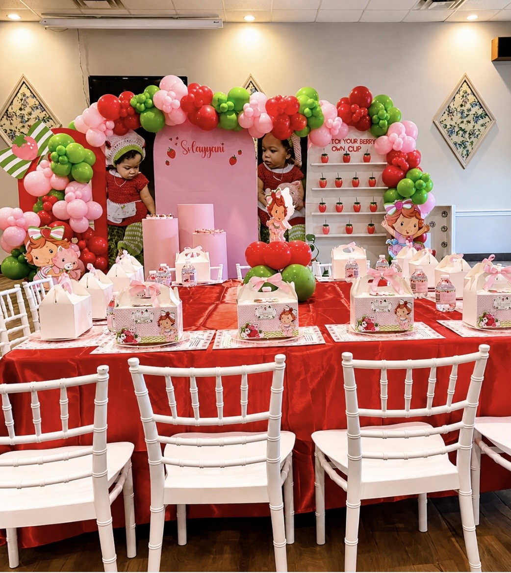 Strawberry Shortcake themed party with balloon arch