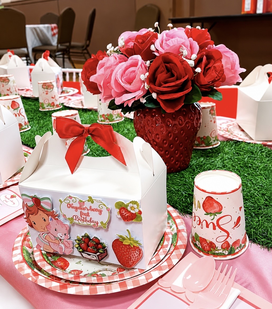 Strawberry themed tablescape with red roses centerpiece